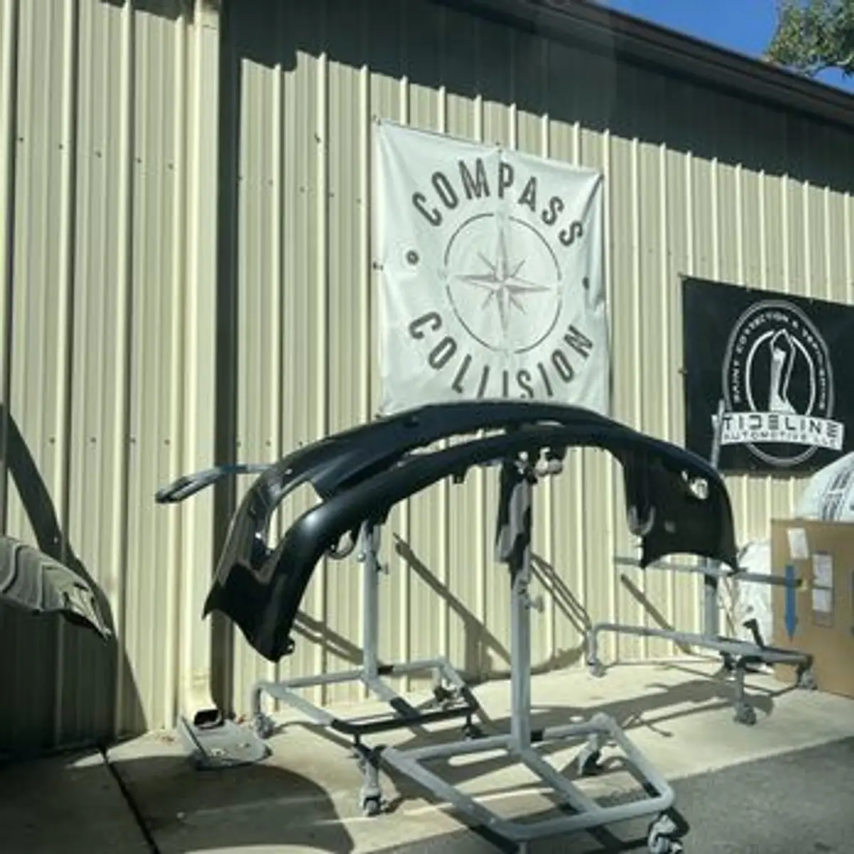 Bumper on paint stand at Compass Collision Charleston SC