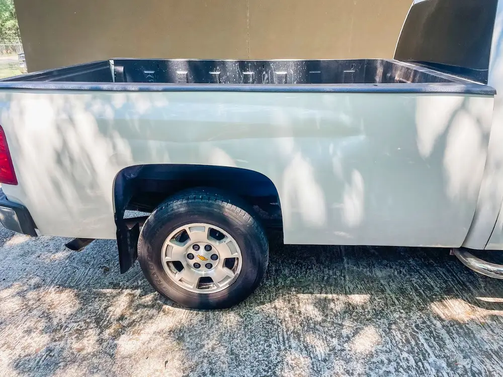 Truck bed dent repair in progress Charleston SC